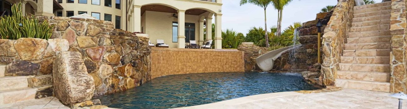 Better Living Beautiful view from an estate home overlooking a swimming pool.