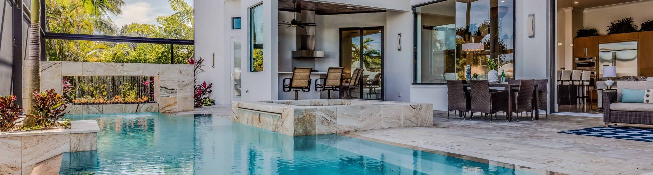 Pool area of Florida mansion Clear water and clear sunny day