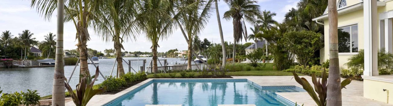 Swimming Pool and Spa Overlooking Waterway Beautiful swimming pool in Florida.